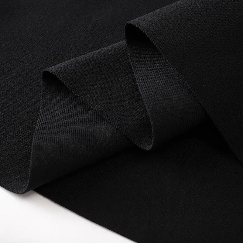 南油高端春秋圆领收腰弹力优雅简约小黑裙小飞袖针织毛衣连衣裙女